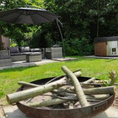 Vrijstaande 6 persoons Bungalow hottub en pizzaoven op vakantiepark