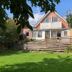 Baumberger Ferienhaus mit Garten & Wintergarten mit 3 Schlafzimmern & 2 Bädern