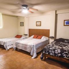 Suite con 2 recamaras,2mini splits, Parking Wifi 100 mb, cocina