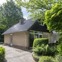 Attractive house with two bathrooms on a holiday park in the woods