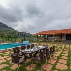 StayVista's Ficus Farms - Mountain-View Haven with Rustic Artsy Interiors, Outdoor Pool, Glasshouse, Home Theatre & Karaoke Delight