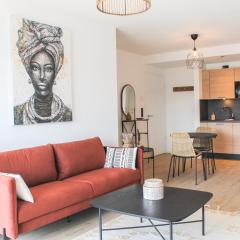 African-Style Apartment - stadtnah, Parkplatz, E-Ladestation für Auto & Fahrräder, Gitterbox für Fahrräder, Fitnessstudio