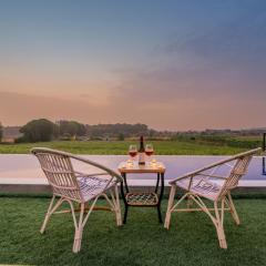 SaffronStays Onellaa, Nashik - infinity pool villa surrounded by a vineyard