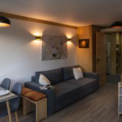 Courchevel 1550 - SUPERBE appartement SKIS AUX PIEDS !