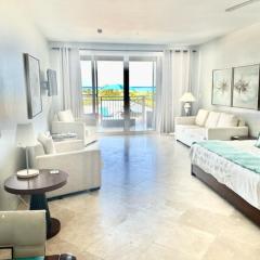 Private Poolside, Loft-Like Condo with Panoramic Grace Bay Views, Walk to Beach, Restaurants, & Turtle Cove Marina!