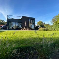 GREEN VILLA in bester Lage - Dachterrasse mit Meerblick - großer eingezäunter Garten - kinderfreundlich - Hunde inklusive - 4 Sterne Resort - direkt am Strand - Pool inklusive