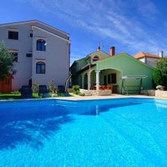 Family friendly apartments with a swimming pool Zadar - 16336