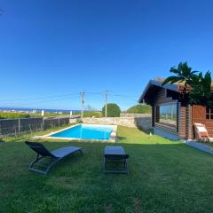 Encantadora moradia T1, com piscina e vista mar a 500m da praia