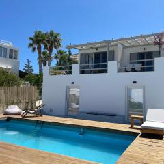 Minimal Blue Apartment with Sunset View in Paros