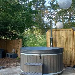 Rumah Senang Ewijk met royale tuin en hottub