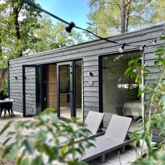 Luxe tiny house STEC midden op de Veluwe in Nunspeet