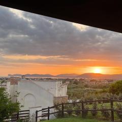 Villetta a schiera con giardino, vista mozzafiato e accesso a piscina