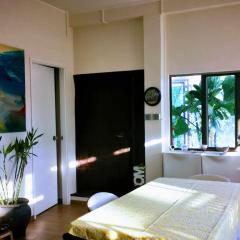 A private room in beachside bungalow for women only