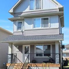 Harbour landing home with 2 living rooms, King bed and 2 car garage