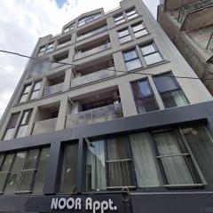 NOOR APARTMENTS