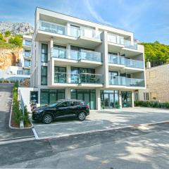 Seaside apartments with a swimming pool Brela, Makarska - 19834