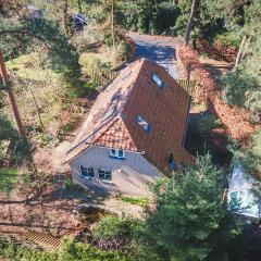 Wellnesshuis met jacuzzi en sauna in het bos