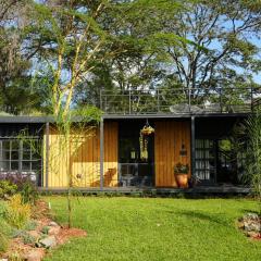 Pumbaa Farmhouse + Cottages