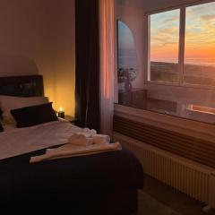 CuxHeaven modernes Studio-Apartment direkt am Meer mit Pool, Sauna und Massage