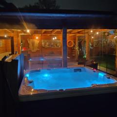 Ecolodge met jaccuzzi en warm zwembad in prachtige tuin met prive sauna Centrum Tilburg