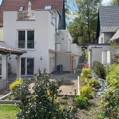 City Wohnung mit Gartenblick und Dachterrasse