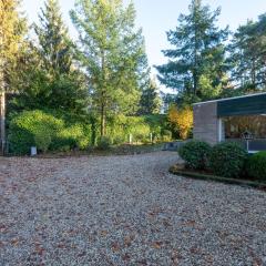 Nice bungalow with washing machine at a holiday park in a natural area