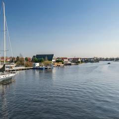 Holiday home with garden near watersports