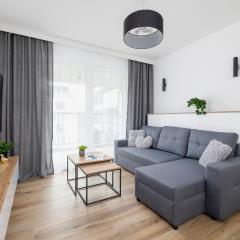 Nowoczesny Apartament z Parkingiem na Alei Pokoju w Krakowie by Noclegi Renters