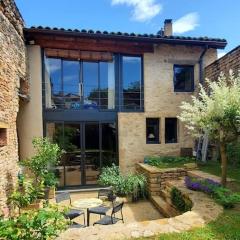 Maison romane avec jardin dans le centre de CLUNY