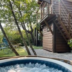 Les lucioles cabane chalet avec Jacuzzi privatif