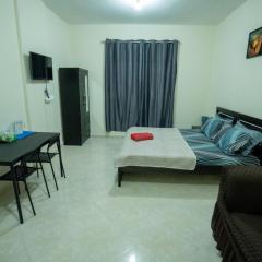 tourist homes abudhabi musaffah near bus station one private Room in three bedroom apartment