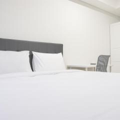 Fancy and Comfort 1BR at Gold Coast Apartment By Travelio