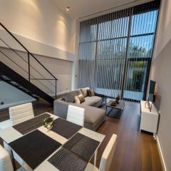 Luxury loft con jardín cerca del aeropuerto