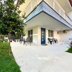 Minimalist Seaside Apartment with Private Patio and Parking