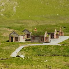 Múlafossur Cottages by famous waterfall in Gásadalur