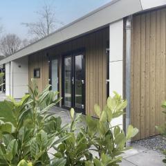 Beautiful chalet on the water in a holiday park