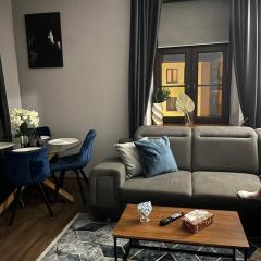 Apartament w centrum z widokiem na studnię 4