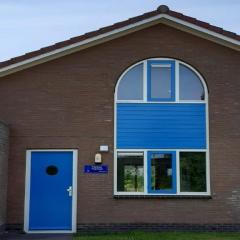 Semi-detached house in Franeker with a shared pool