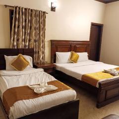 Luxury inn Rooms near Expo center , air port , agha khan