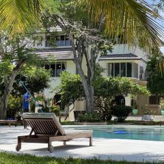 Ocean Bliss BeachFront Villa by YourHost,5 Bedroom, Diani