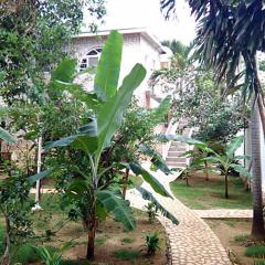 Nature Haven 2BR Stay with Pool and Garden View