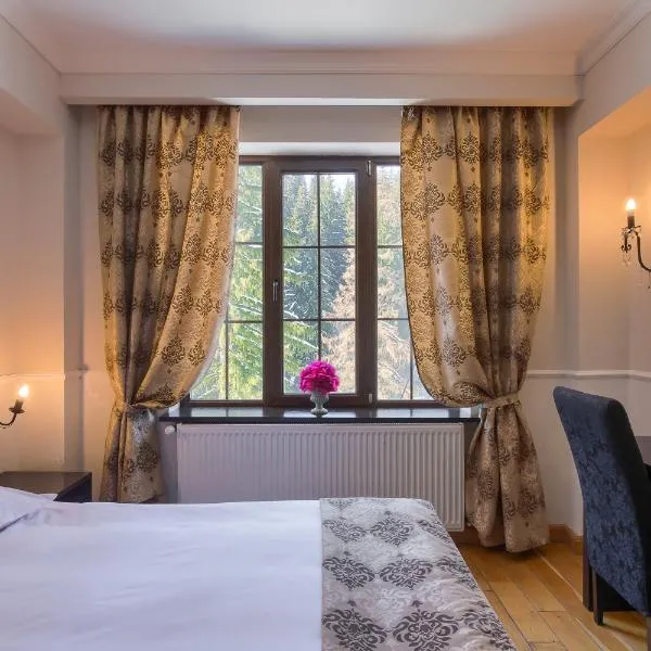 Rizzo Boutique Hotel, hôtel à Poiana Brasov