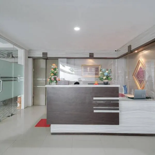 Urbanview Hotel Bari Syariah Palembang By RedDoorz, hôtel à Kenten