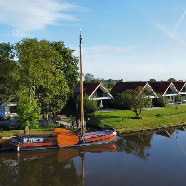 Vakantiehuis aan het water - vakantiepark de Schreiershoek, hótel í Dokkum