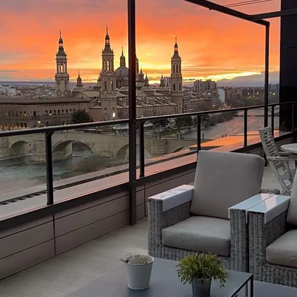 Ático mejores vistas al Pilar jacuzzi y garaje, hotel em Zaragoza