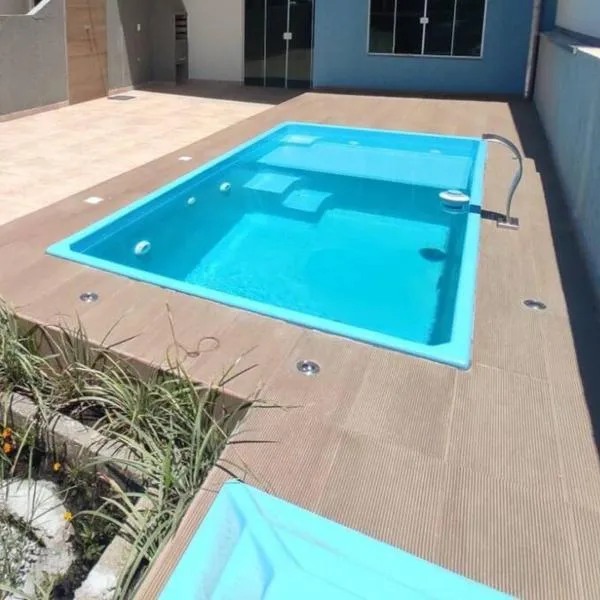 Casa com piscina em Pontal do Paraná - Balneário de Ipanema, hotel en Matinhos