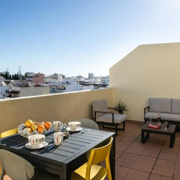 Penthouse Olhão with terrace, отель в Ольяне