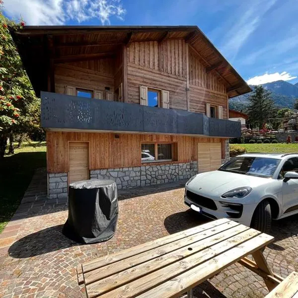 Chalet Bel-Air A due passi dalle piste, con giardino e posto auto โรงแรมในปัสโซเดลโตนาเล