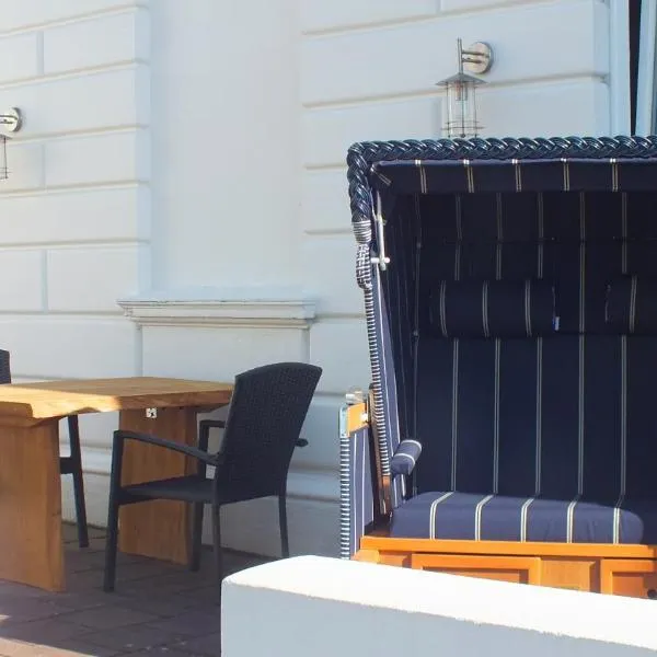 Zentrale Wohnung in der Villa Liewald mit Terrasse und Glasfaseranschluss, hotel in Norderney