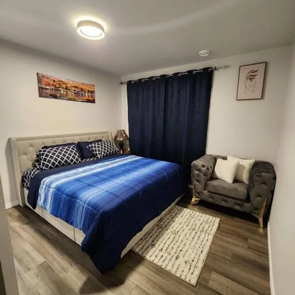 Cozy one bedroom in Airdrie，亞德里的飯店